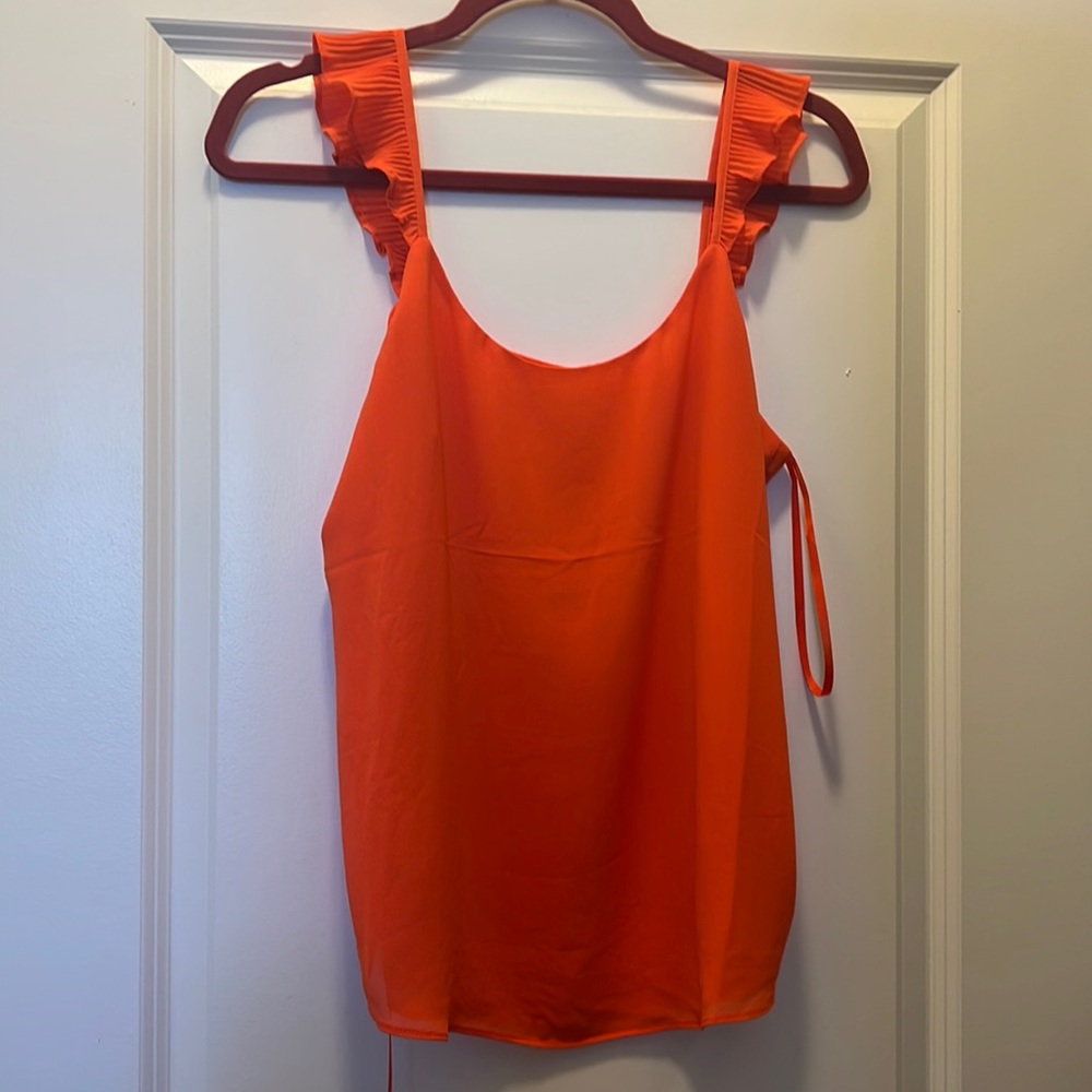 Naked zebra tank with tags. Size medium.